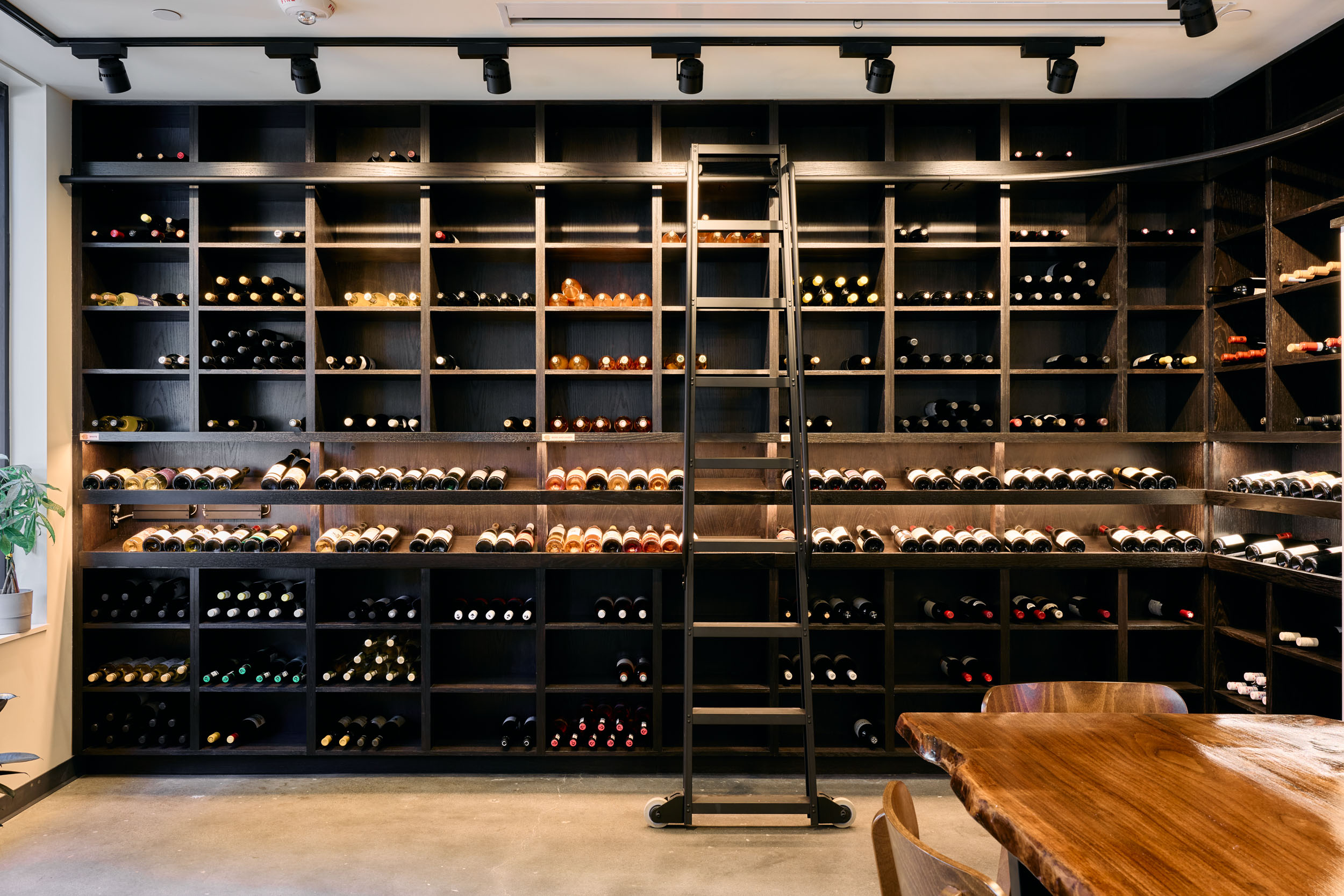 Custom wine rack with rolling ladder