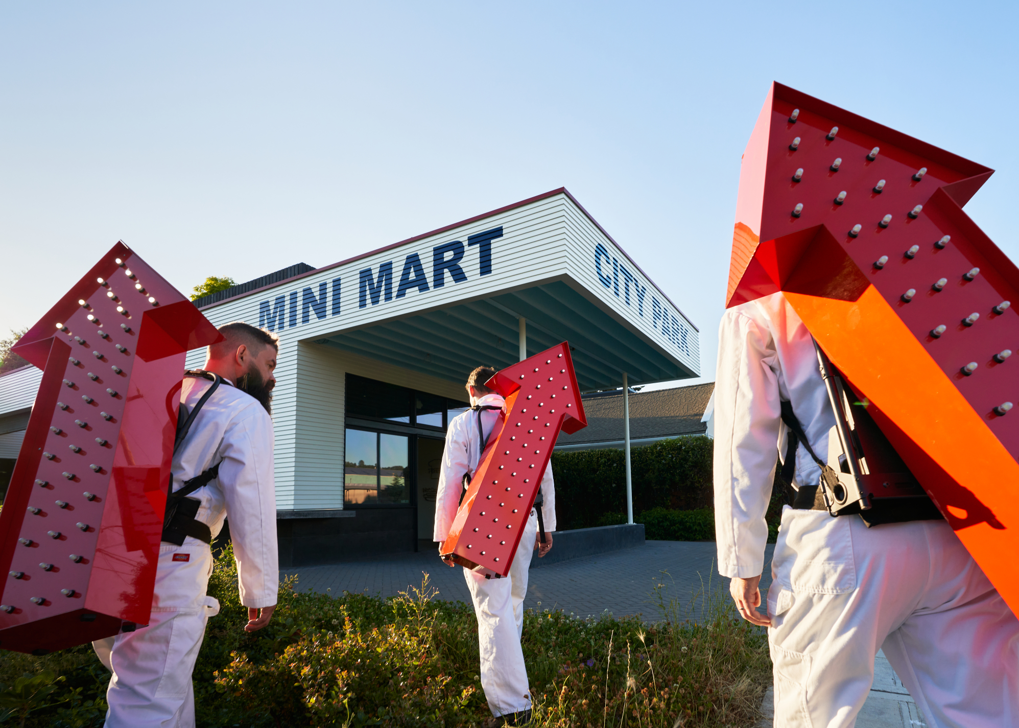 Men with arrows on their back walk towards MMCP